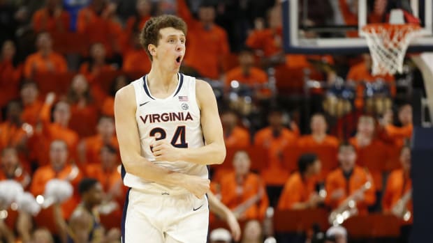 Virginia Cavaliers forward Jacob Groves (34) celebrates after scoring against the Notre Dame Fighting Irish during the first half at John Paul Jones Arena.
